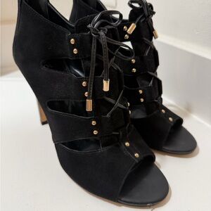 Isola Black Heels with Gold Accents